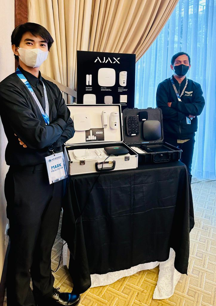 AA2000 team showcasing Ajax security products at professional event