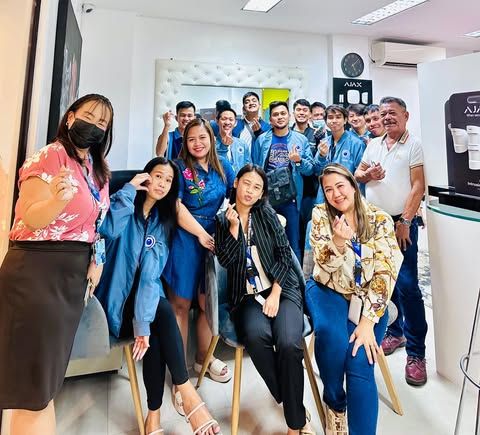 AA2000 diverse team celebration in modern office environment