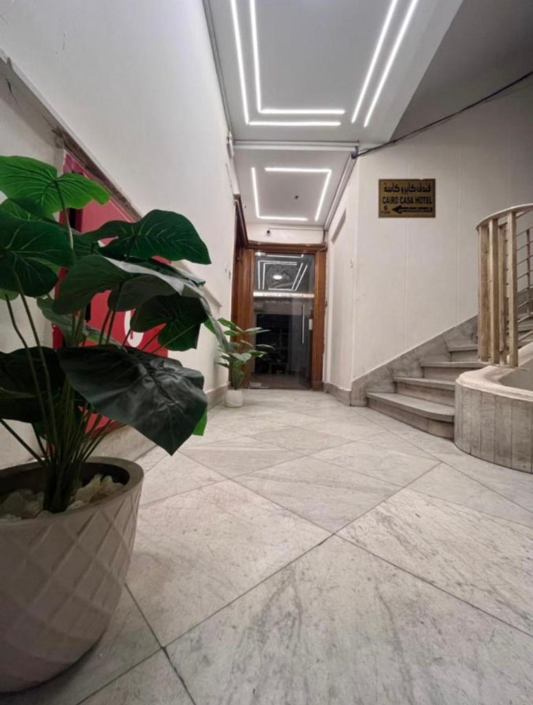 Hotel Lobby - Elegant marble entrance with modern lighting