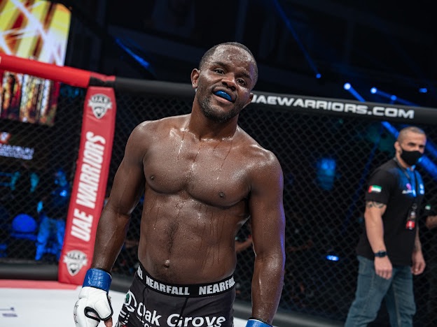 Shawn Bunch walking to MMA cage with focused mindset and mental preparation for competition