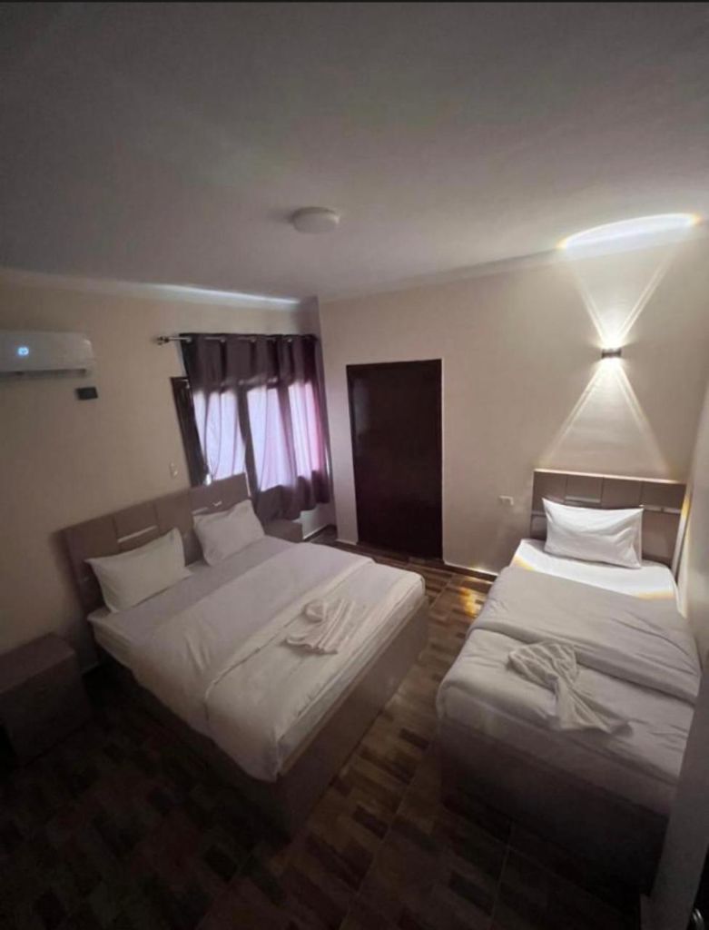 Comfortable Rooms - Clean, modern accommodations with twin beds