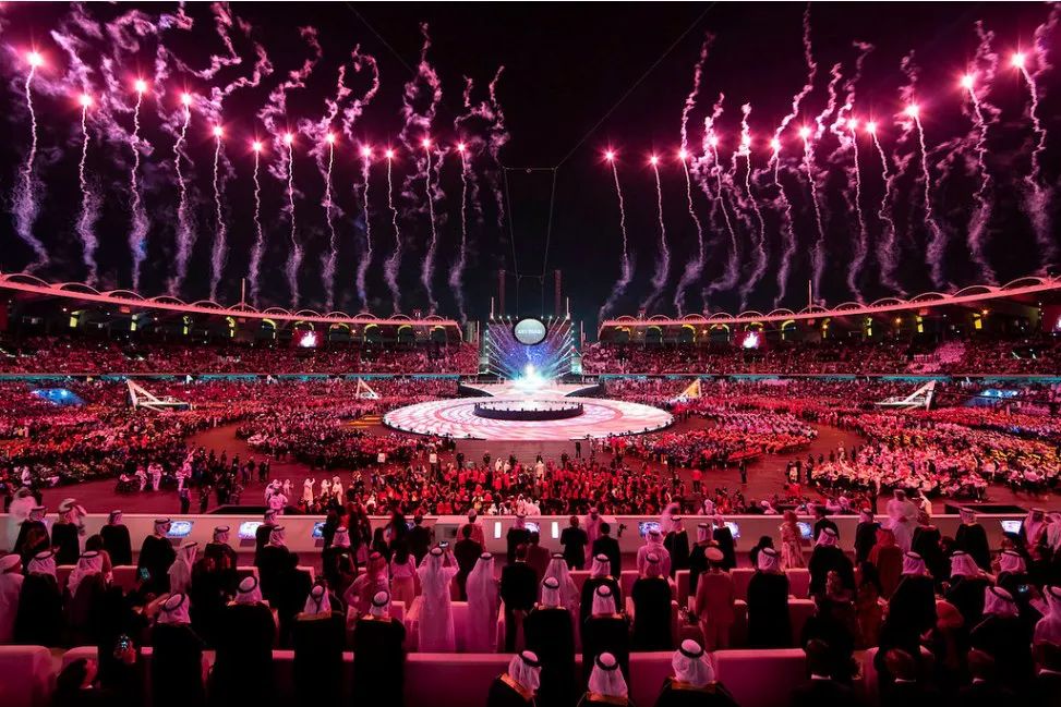 Special Olympics World Games opening ceremony at Zayed Sports City Stadium with spectacular fireworks, thousands of athletes, and VIP dignitaries in attendance
