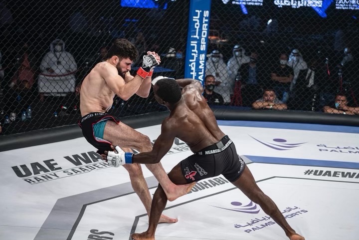 Shawn Bunch competing in professional MMA fight showcasing elite combat sports training
