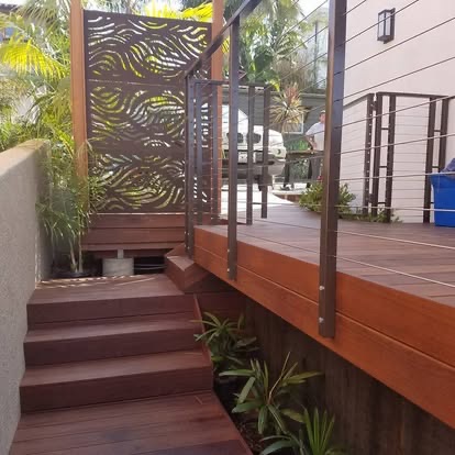 Custom outdoor living space with deck and entertainment area