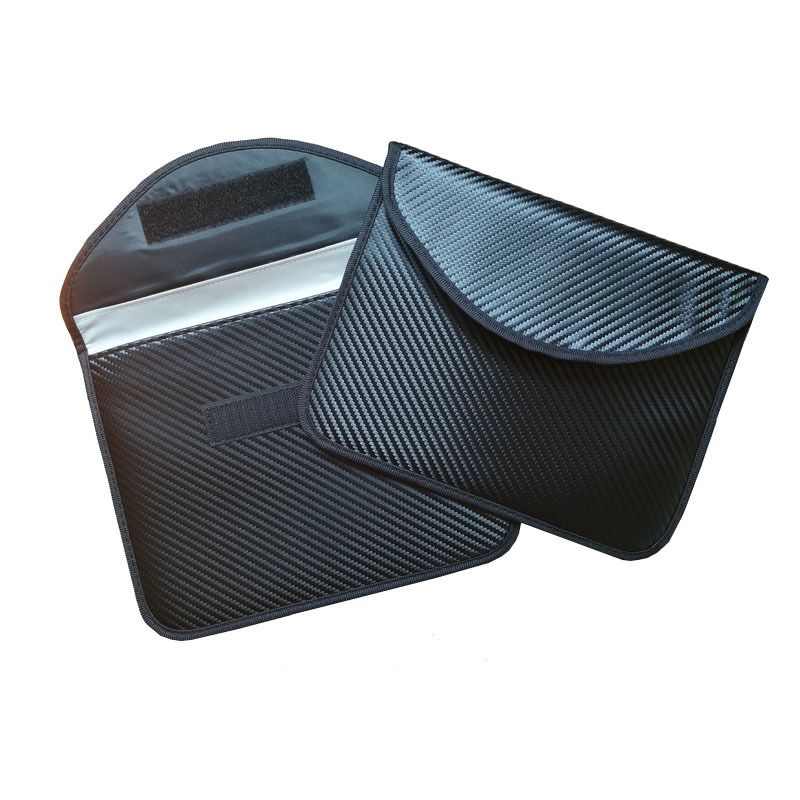 RFID blocking bags with carbon fiber exterior showing multi-layer Faraday cage construction and silver shielding interior