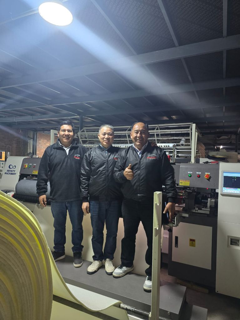 Infinity Machinery technical team conducting equipment maintenance in Peru production facility
