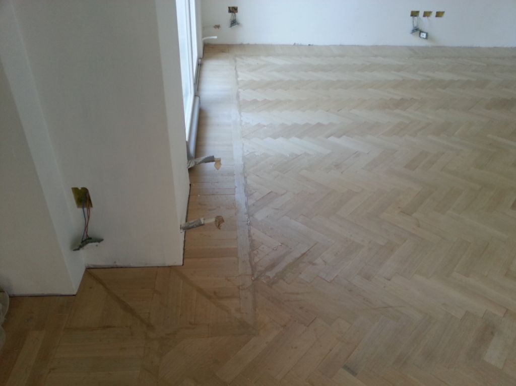 Restauro pavimento in legno spina pesce Recanati