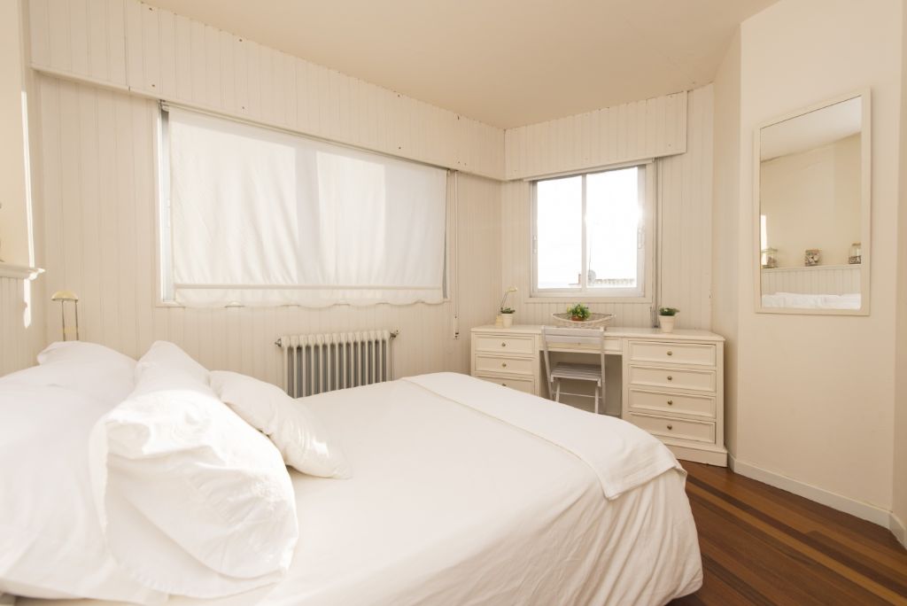 Dormitorio con Vistas a la Ría y Puerto