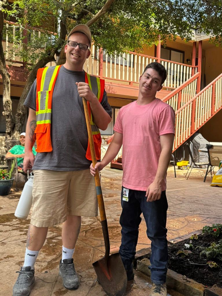 Volunteers engaged in manual labor and construction work for criminal justice programs