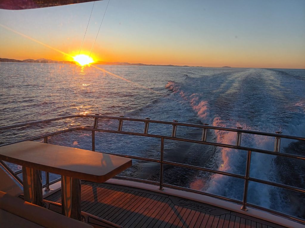 Golden hour motor yacht delivery in New Zealand waters