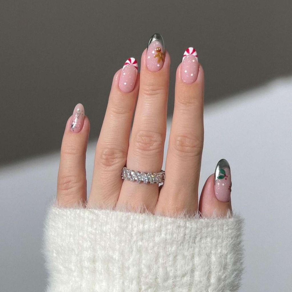 Sophisticated pink chrome reindeer Christmas nails
