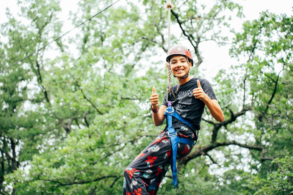 Achievement and confidence shown through adventure activities, symbolizing personal growth and overcoming life's obstacles