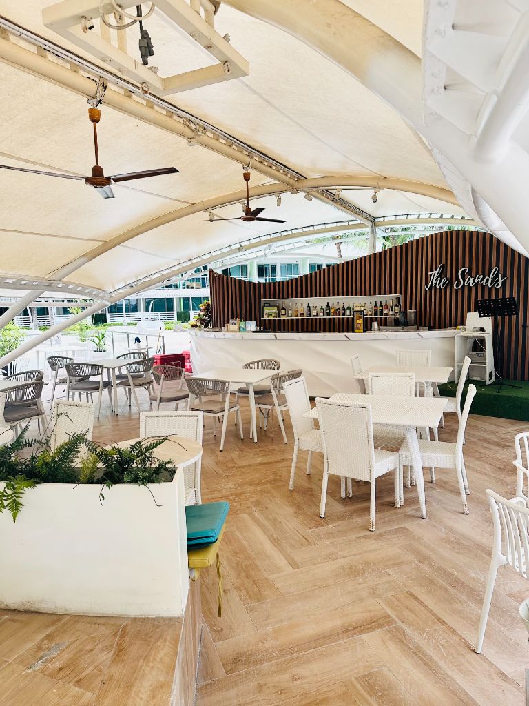 Azure Urban Resort The Sands restaurant with outdoor dining and modern architecture