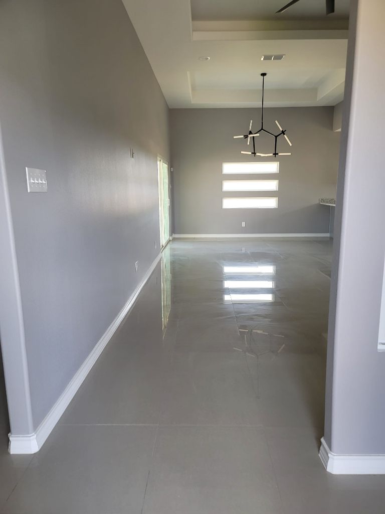 Long hallway with chandelier
