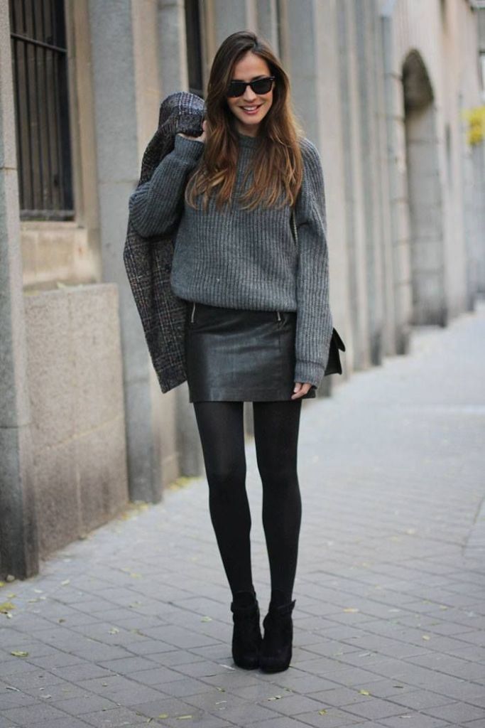 Grey turtleneck with leather mini skirt textured monochrome