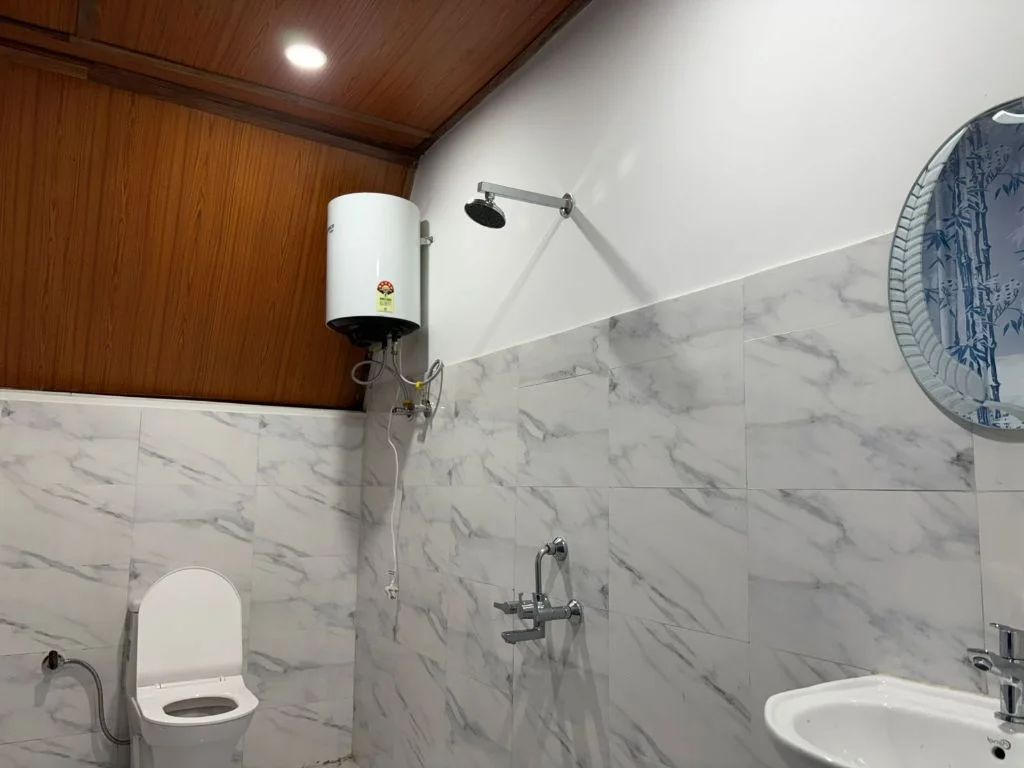 Clean modern bathroom with marble tiles