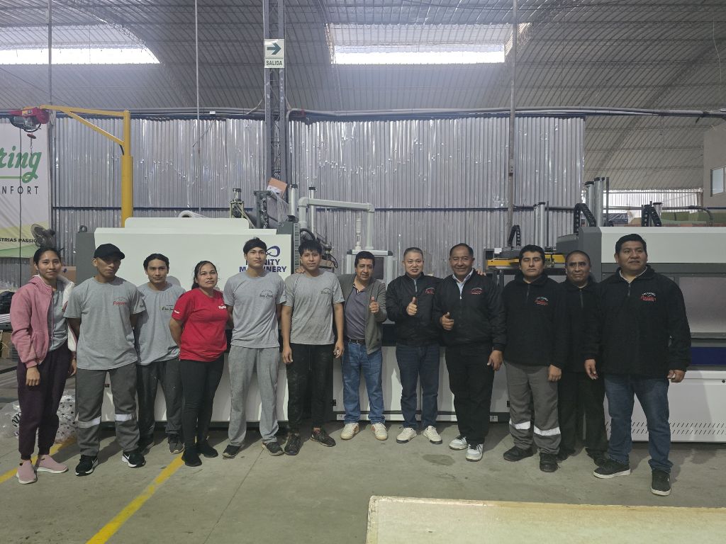 Infinity Machinery technical team with Peru production facility staff showcasing successful collaboration