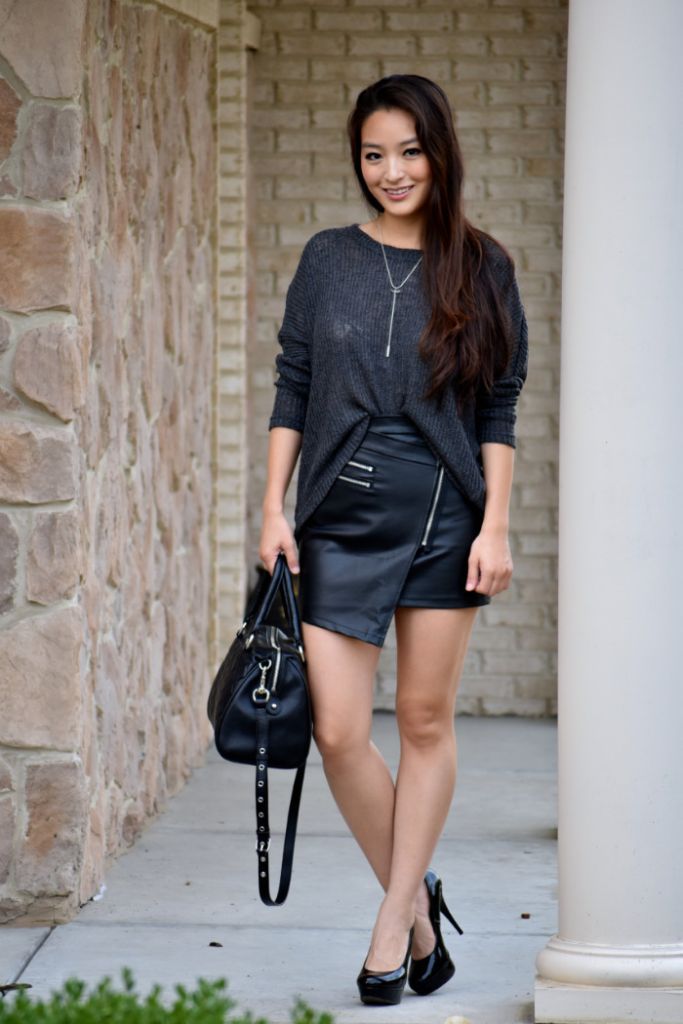 Charcoal oversized sweater with leather mini skirt and tights