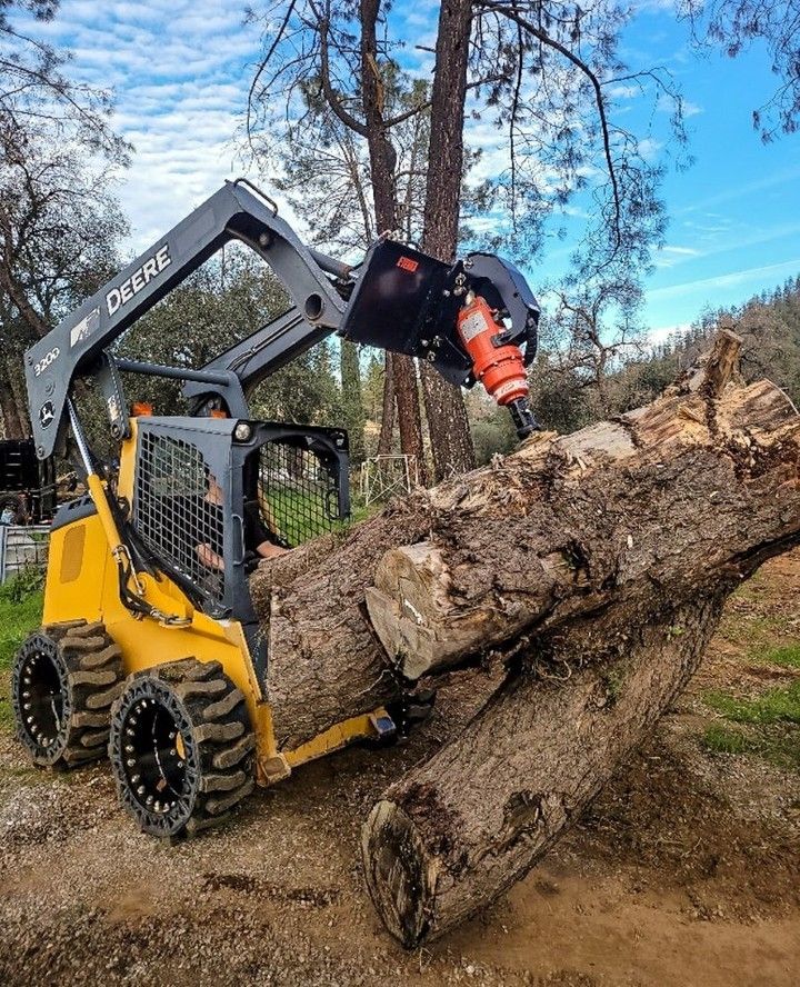 Construcción - Deere Skid Steer con Evolution Wheel