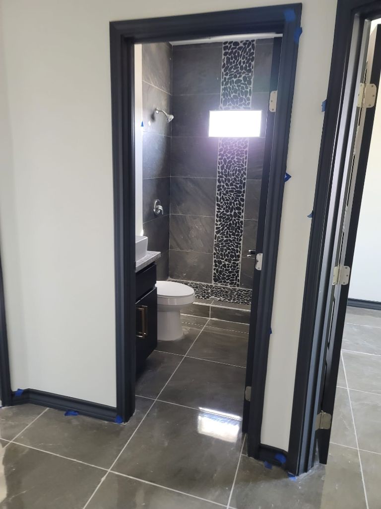 Pristine bathroom with glossy tiles