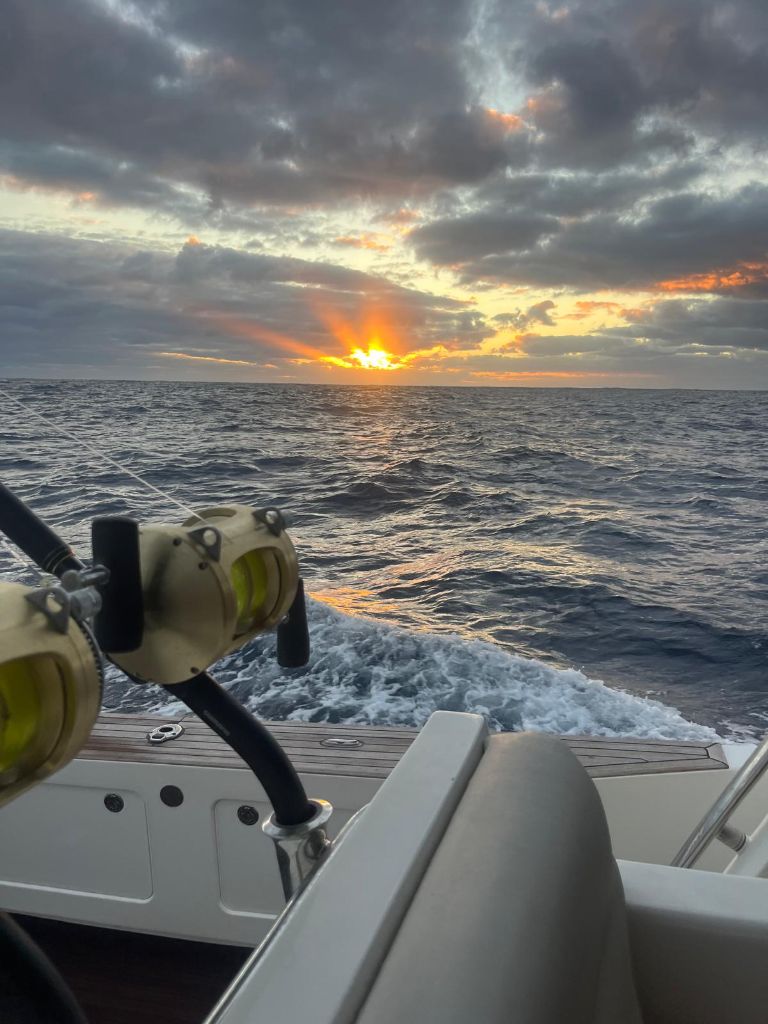 Dramatic sunset fishing with outriggers