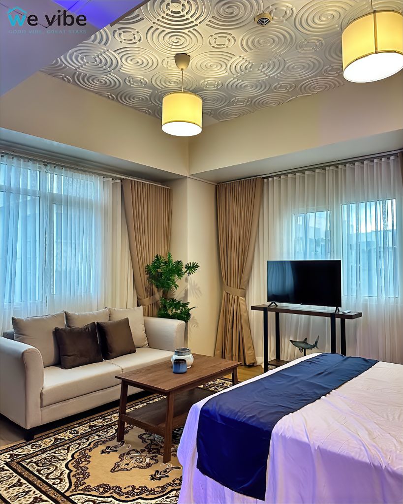 81 Newport Blvd spacious bedroom with elegant ceiling design and modern furnishings