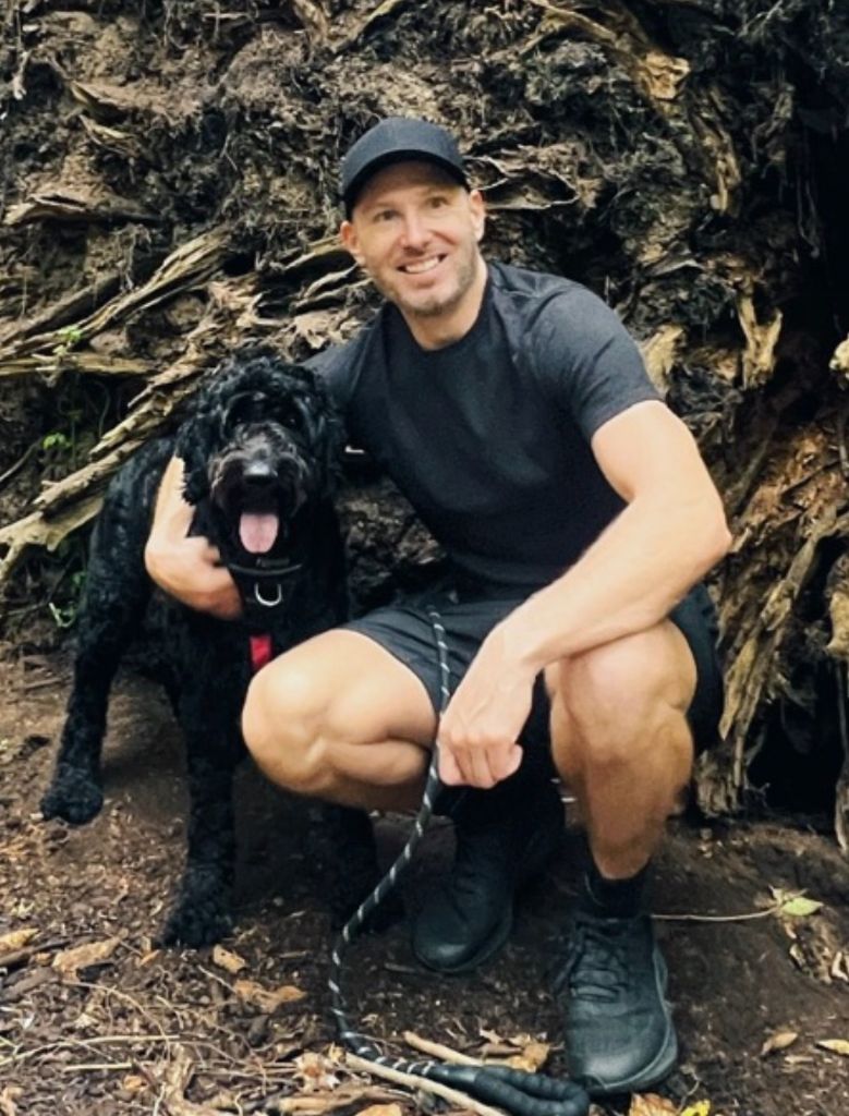 Founder with Louie the dog