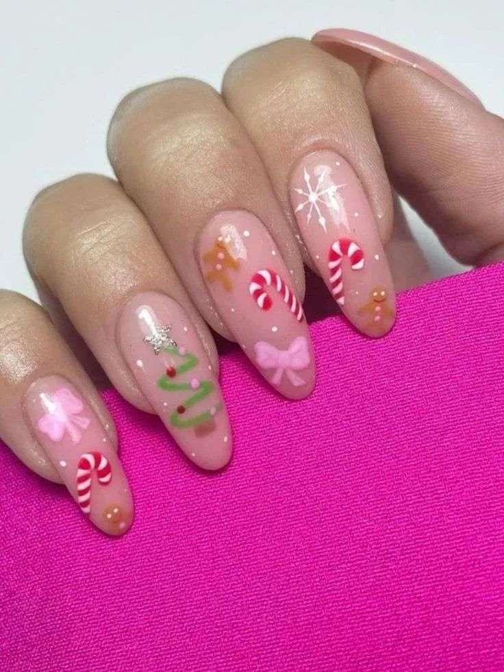 Sweet pink candy cane Christmas nails